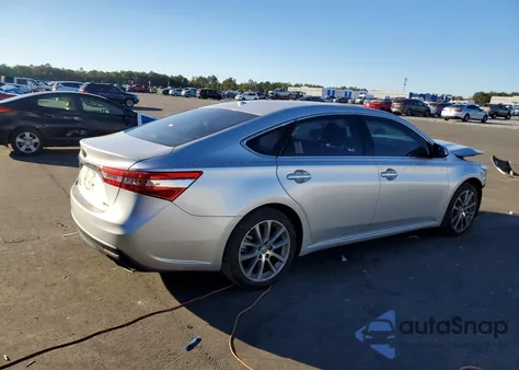 2014 Toyota Avalon Base z USA, uszkodzony, nr VIN 4T1BK1EB6EU128421